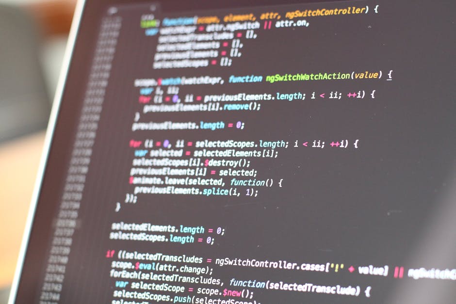 A close-up view of a computer screen displaying colorful lines of code against a dark background, with visible syntax highlighting in shades of pink, blue, green, and white. The code appears to be Jav
